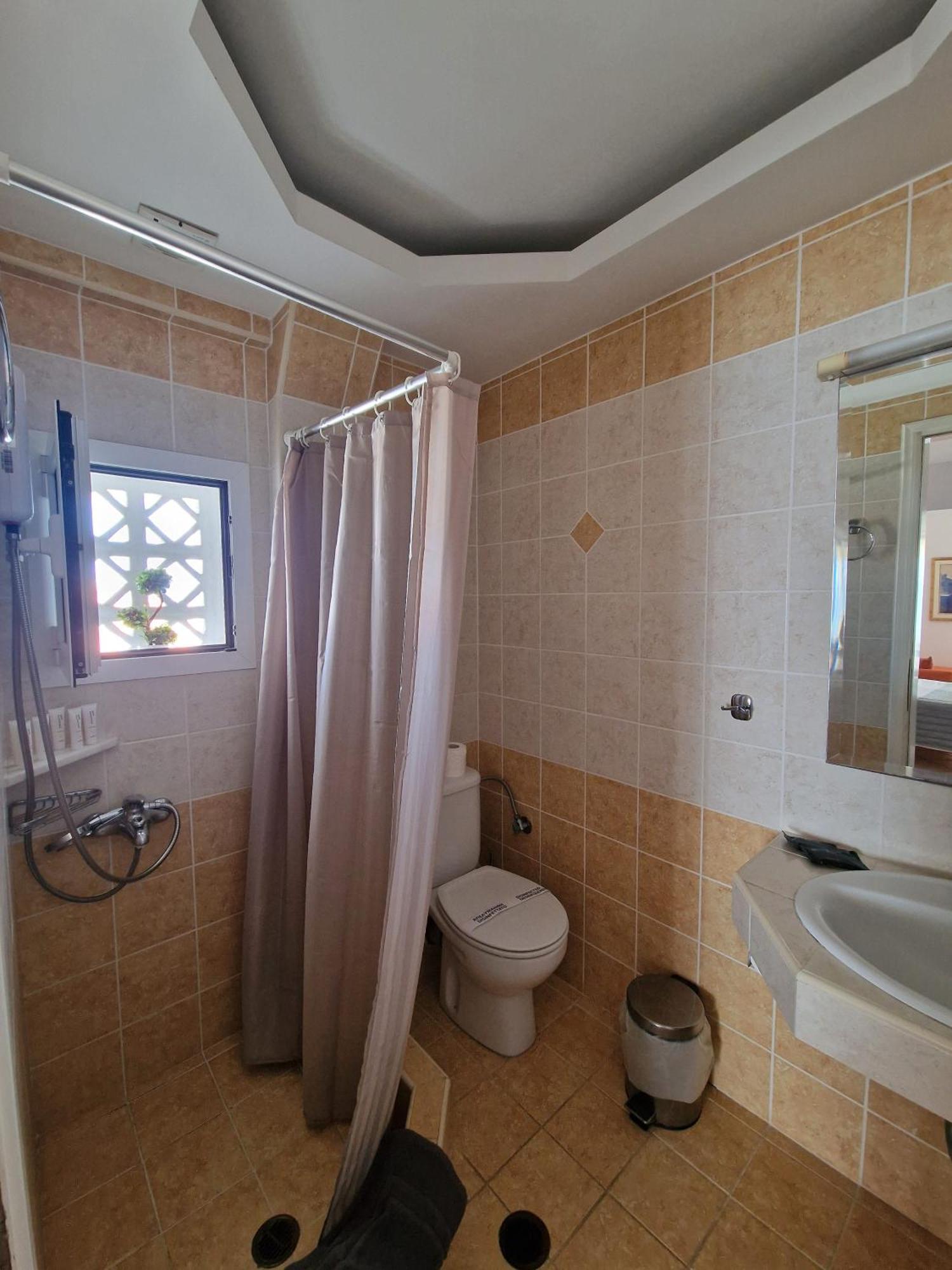 Aparthotel Porto Xronia à Khrónia Extérieur photo